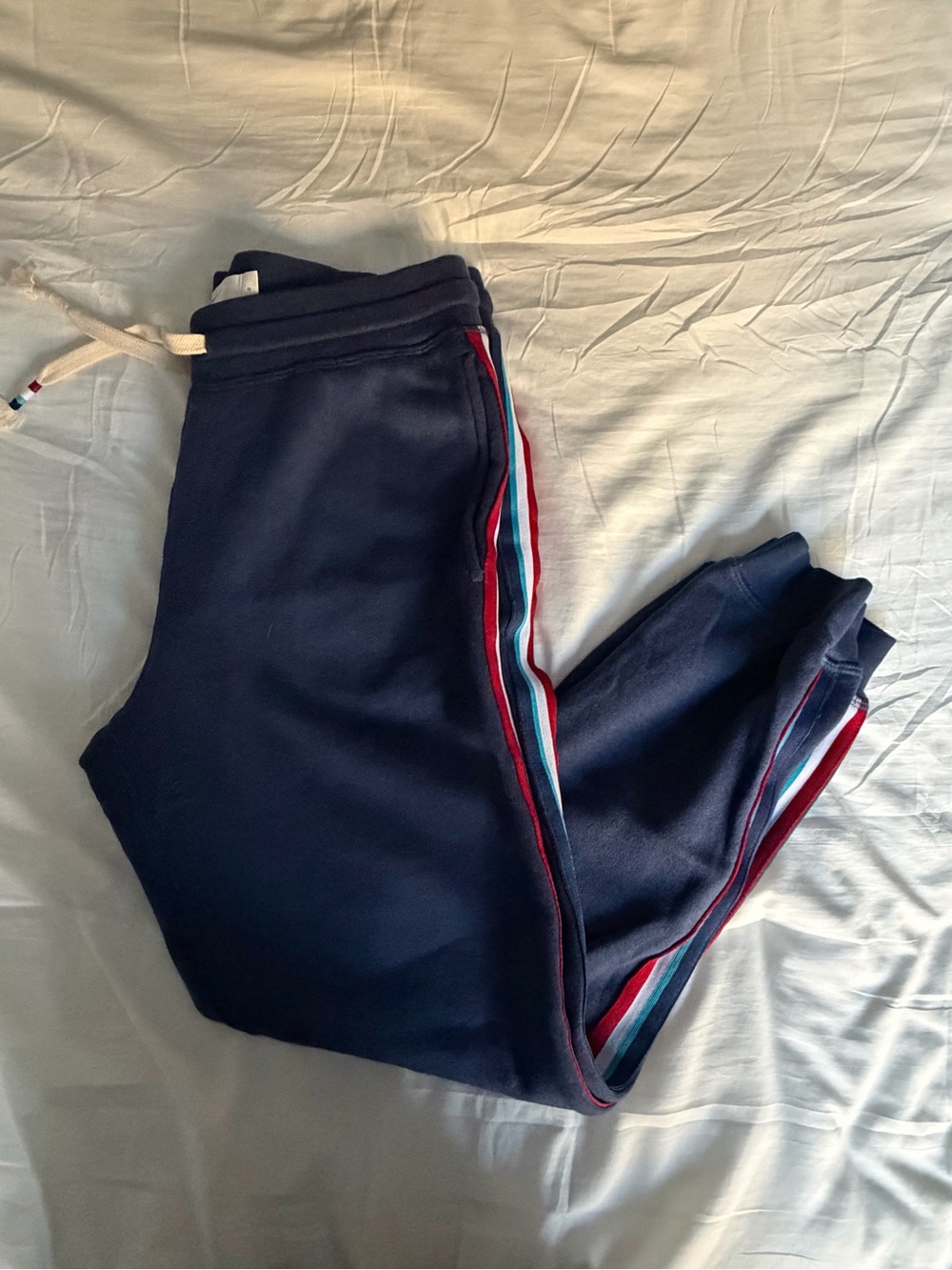 NWOT Sol Angeles Navy Joggers with Red and Teal Side Stripes